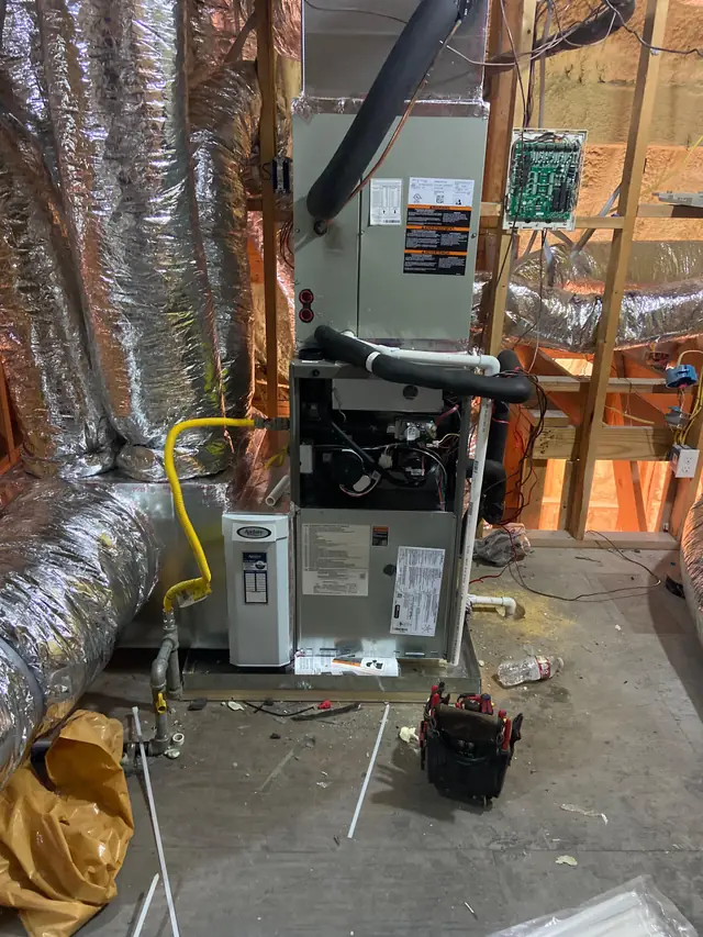 American Standard air handler and Aprilaire media cabinet part way through an attic install